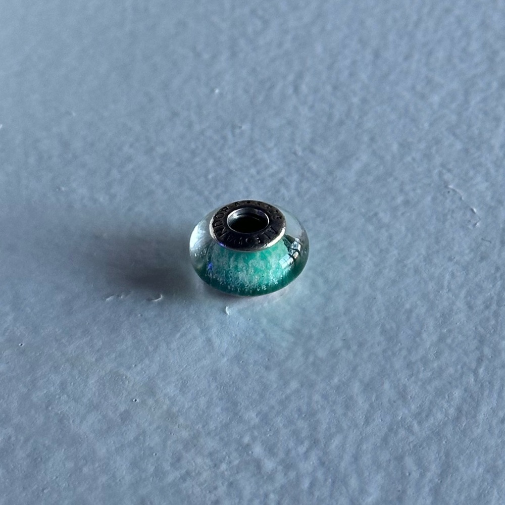 Pandora: Turquoise color charm with slight sparkle